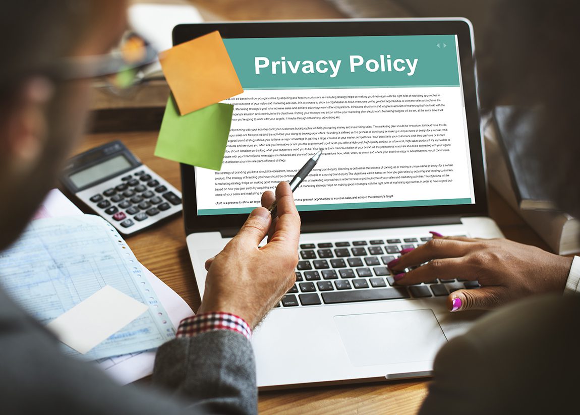 Laptop displaying a privacy policy